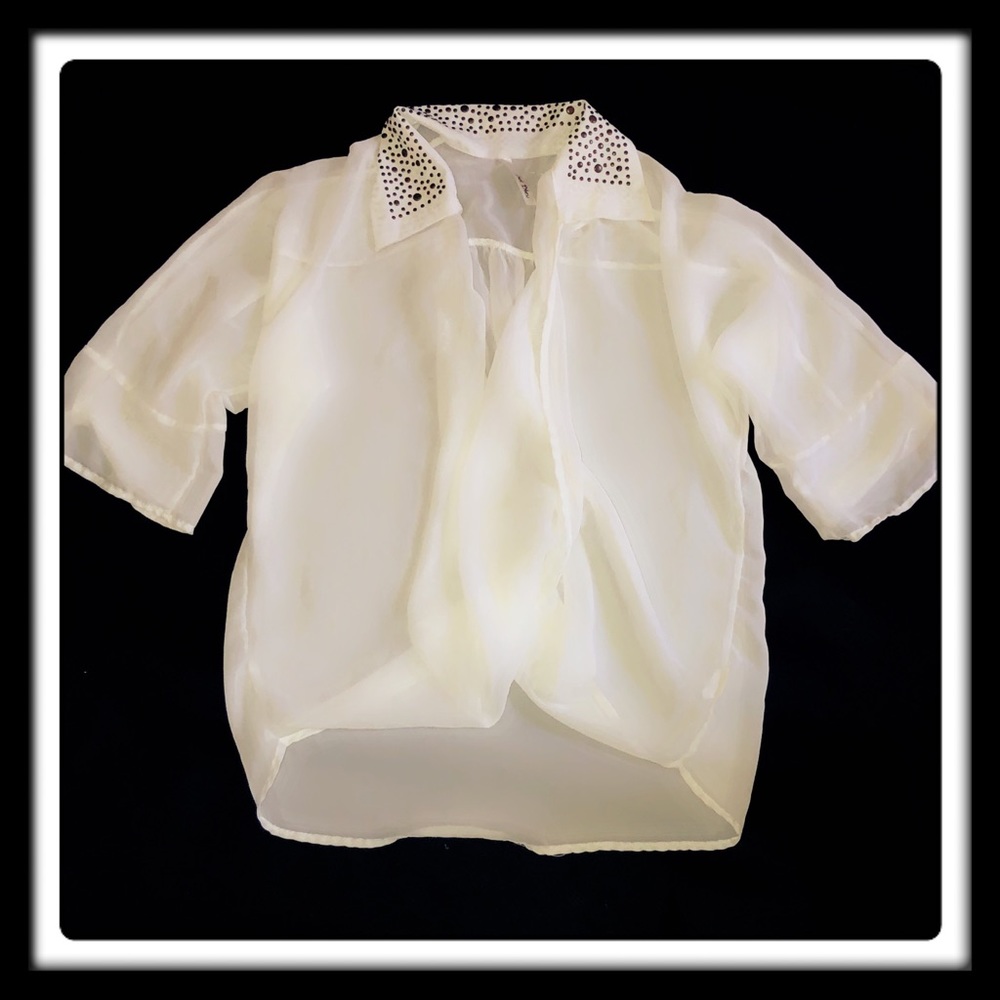 White/creamed color blouse